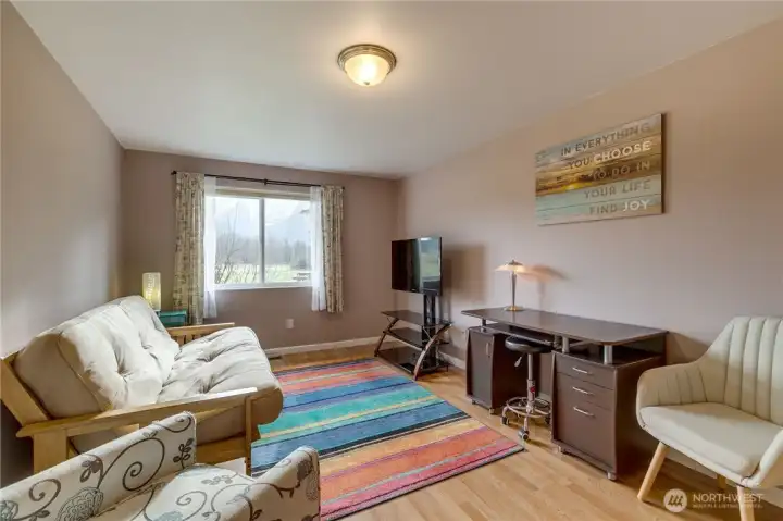 Bedroom #1 currently used as an office space. Notice the view of the mountain through the window.