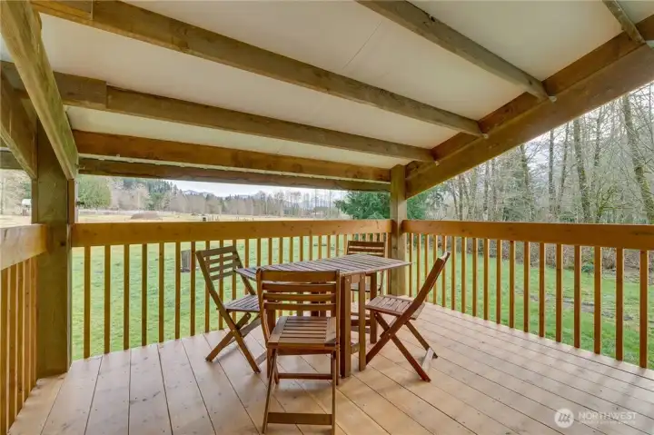 Owners created this nice deck which is accessed from the upper level of the shop.