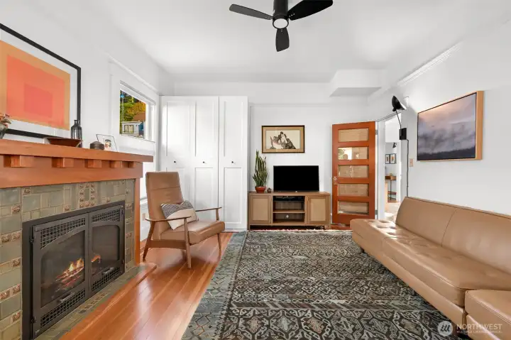 The cozy den is located off the left side of the entry and is currently used as a TV room but could easily be a second main floor bedroom if needed.