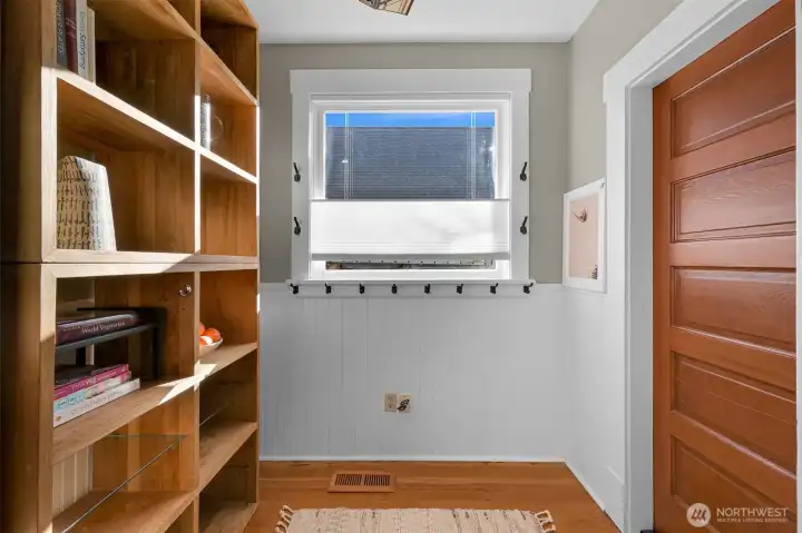 Additional space off the kitchen and the door leading to the spacious basement with lots of extra storage space