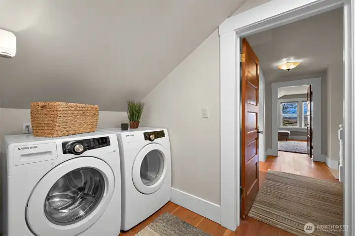 The laundry is conveniently located upstairs off the hallway between the second and third bedrooms