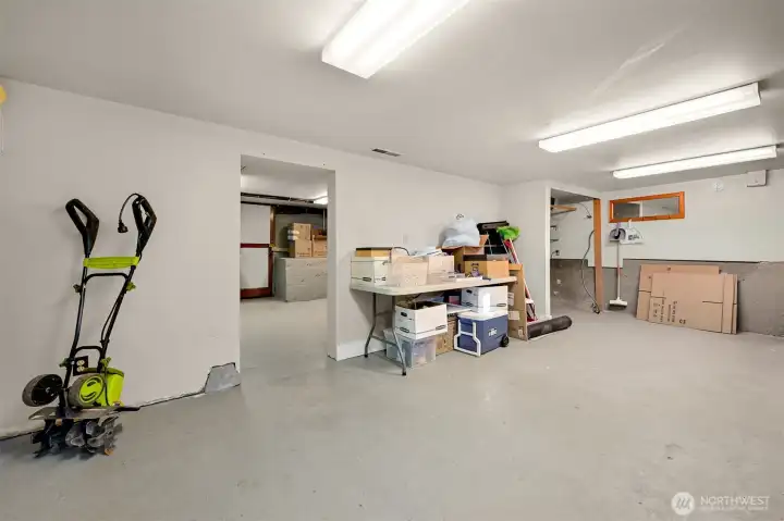 The basement is extra clean and bright and offers an additional 600 SF of storage/workspace (along with a separate entry)