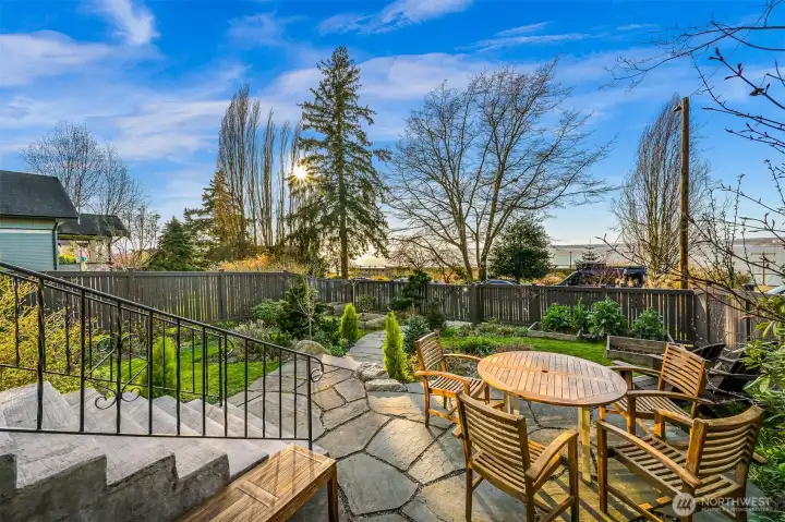 And gardeners will LOVE the raised beds and beautifully established landscaping