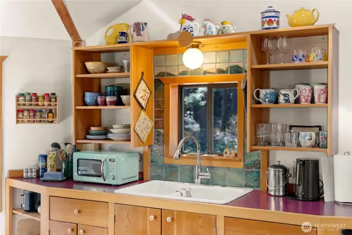 The double cast iron sink adds to the overall appeal.