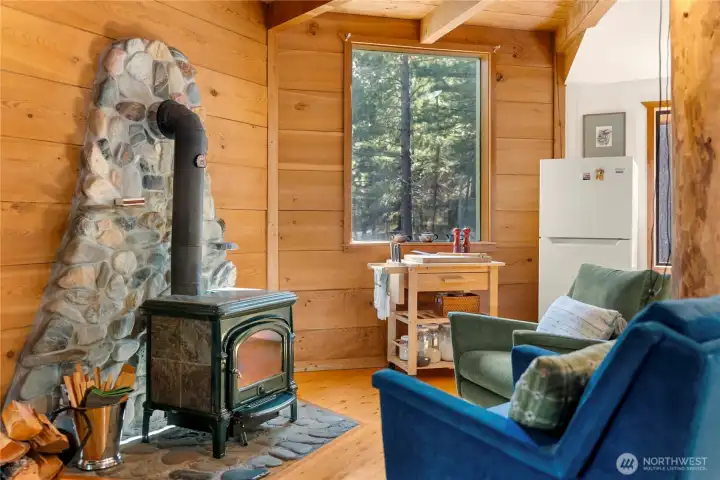 Gather round the cozy woodstove in wintertime. Gather round the cozy woodstove in wintertime.