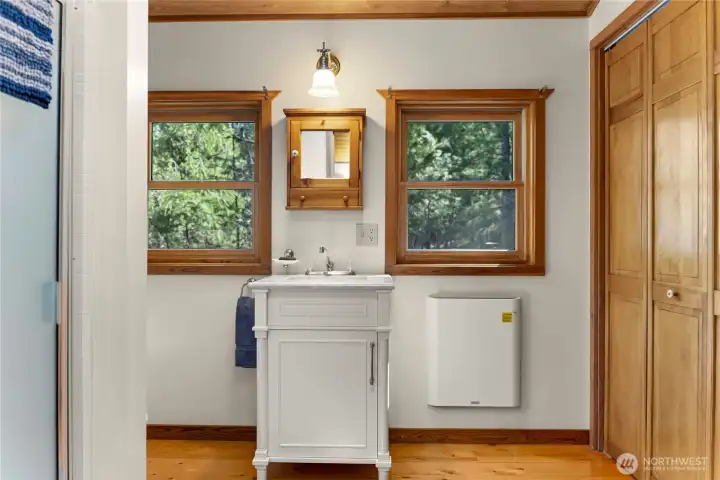 The roomy 3/4 bath has a large closet for storage.