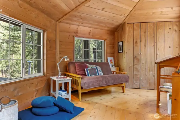 The upstairs is light and bright and is roomy enough as a combo guest bedroom, yoga studio and study. The upstairs is light and bright and is roomy enough as a combo guest bedroom, yoga studio and study.
