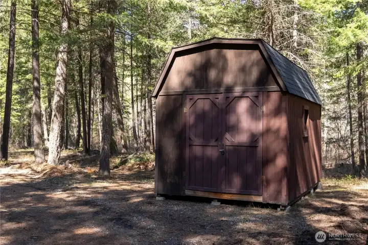 A large storage shed serves as a great shop.