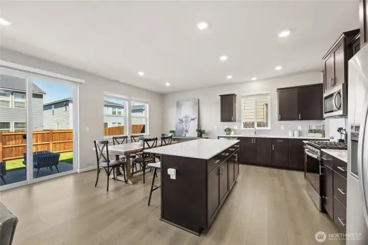 Large center island. Home is staged.