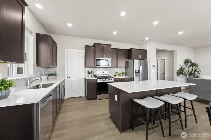 Quartz countertops. Home is staged.