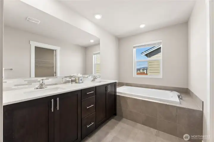 Soaking tub. Home is staged.