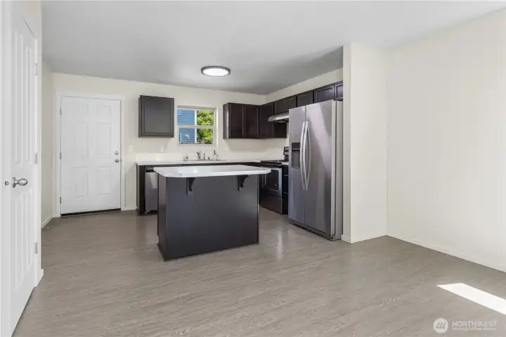 Efficient kitchen with pantry to the left (not shown in this photo)