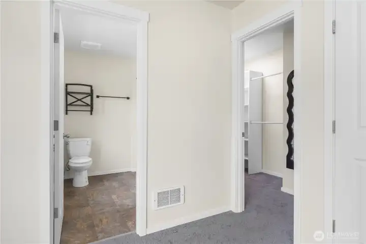 Primary bath and walk-in closet