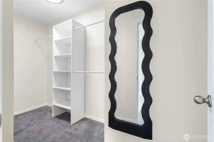 The walk-in closet provides ample space!
