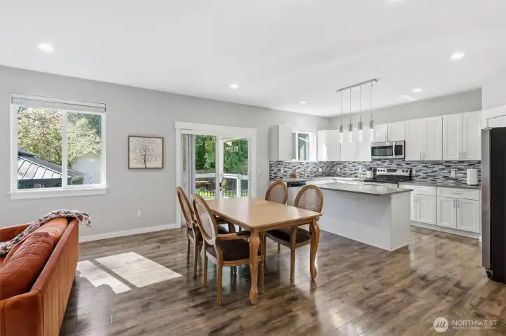 Easy flow from living to dining to kitchen makes entertaining effortless. Easy flow from living to dining to kitchen makes entertaining effortless.