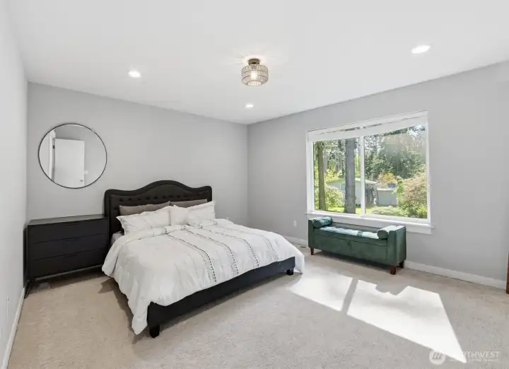 Spacious primary suite with room to truly unwind at the end of the day. Spacious primary suite with room to truly unwind at the end of the day.