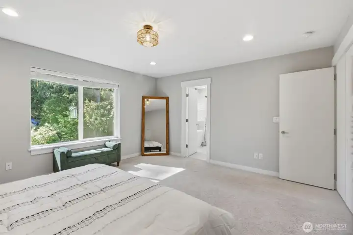 Soft natural light creates such a peaceful feel in the primary bedroom. Soft natural light creates such a peaceful feel in the primary bedroom.