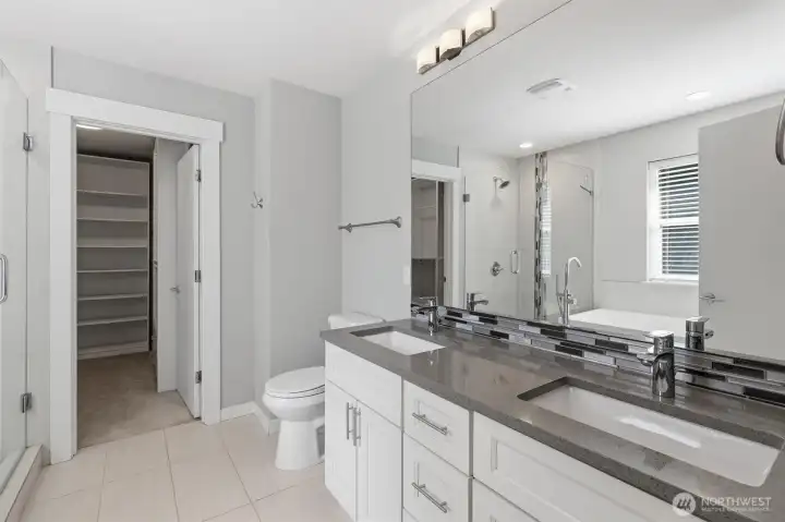 Double vanity + generous space make busy mornings feel easy. Double vanity + generous space make busy mornings feel easy.