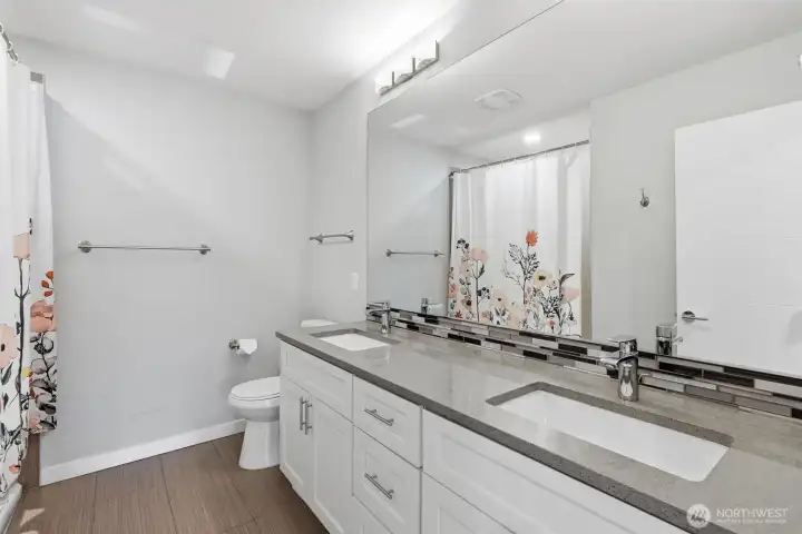 Spacious bathroom with clean finishes and plenty of room to spread out. Spacious bathroom with clean finishes and plenty of room to spread out.