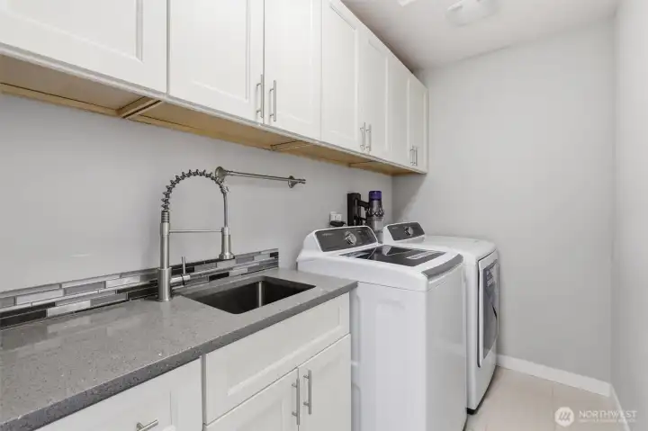 Dedicated laundry space designed to make everyday routines easier. Dedicated laundry space designed to make everyday routines easier.