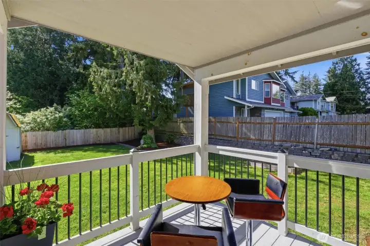 Covered outdoor living perfect for summer dinners and cozy evenings outside. Covered outdoor living perfect for summer dinners and cozy evenings outside.
