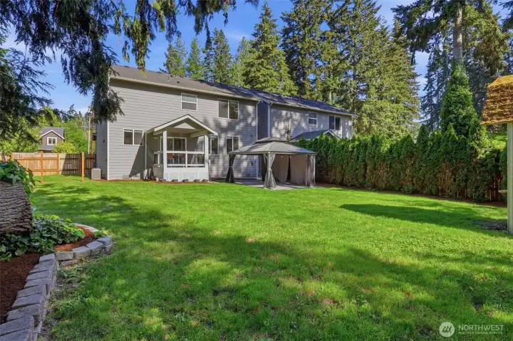 A backyard with room to play, garden, entertain, or simply enjoy the sunshine. A backyard with room to play, garden, entertain, or simply enjoy the sunshine.