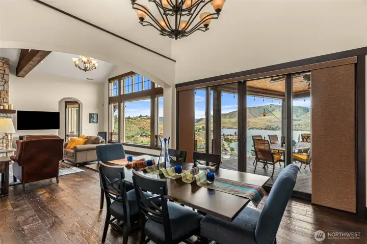 Elevated dining with breathtaking views.  French doors open to the outdoor dining area.