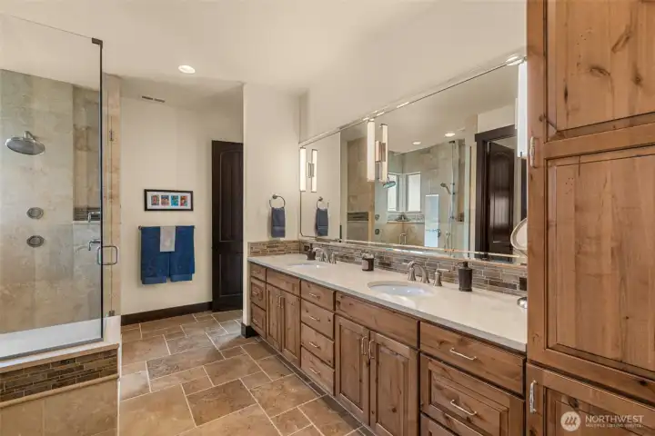 Ensuite with heated traverine floor, heated shower floor and shower bench.