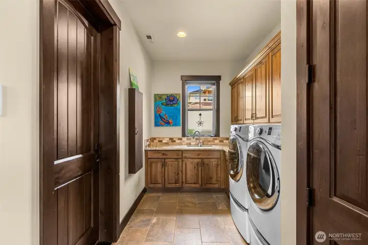 Large laundry room with extra storage