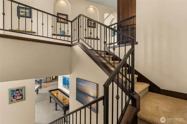 Grand staircase to lower level.