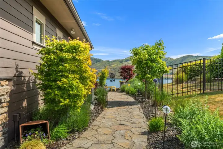Pathway to landscaped yard.