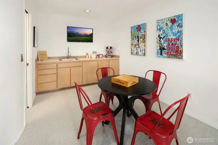 Opposite view of the other side of the Bonus room with wet bar/storage area and adjacent 3/4 bath.