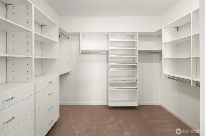 Spacious walk in primary closet