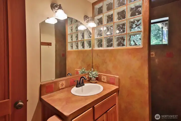 Main Level 3/4 Bath with walk-in shower. Main Level 3/4 Bath with walk-in shower.