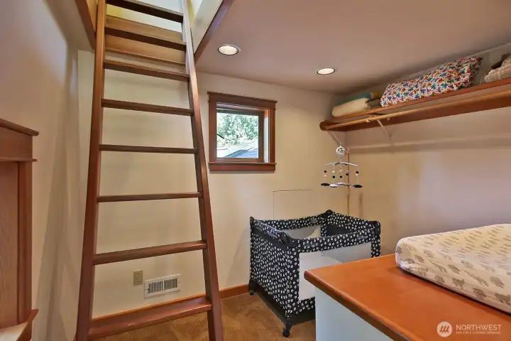 Spacious walk-in closet currently lives as a nursery. Up the ladder to the Crow's Nest. Spacious walk-in closet currently lives as a nursery. Up the ladder to the Crow's Nest.
