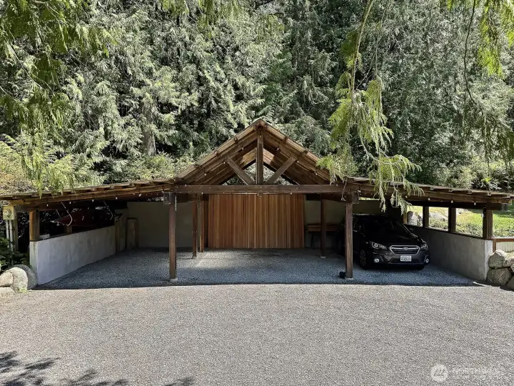 3-Car Timber Frame Carport built with Cedar & Fir from the land. 3-Car Timber Frame Carport built with Cedar & Fir from the land.