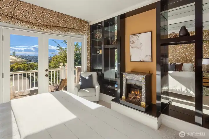 French doors and a fireplace looking out to Lake Union French doors and a fireplace looking out to Lake Union