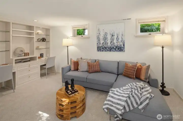 Rec room with built in desk, shelving and cabinets Rec room with built in desk, shelving and cabinets