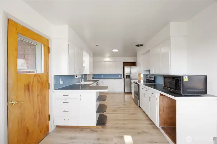 Kitchen, Door to backyard Kitchen, Door to backyard