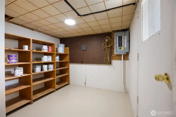 Storage Room in basement with door to backyard Storage Room in basement with door to backyard