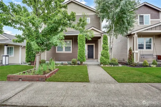 Very nice groomed front yard.