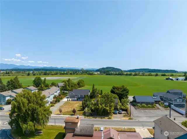 Views to the East takes in the lush green farmlands, Cascade Mountains and foothills.