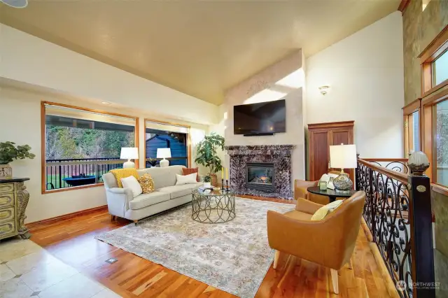 tall ceilings, hardwood floors, gas fireplace