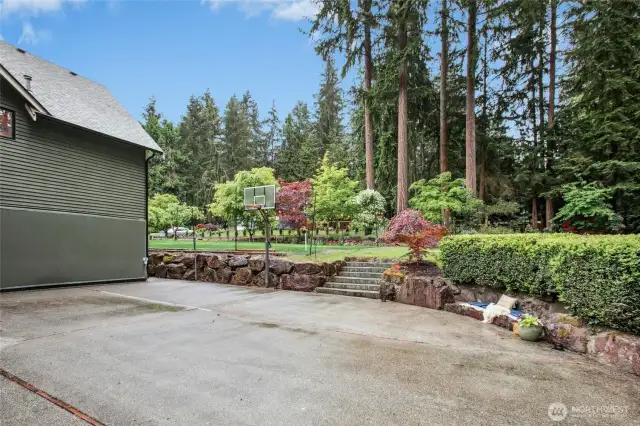 Sport court area for wall ball, bball, playing, another firepit...