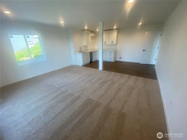 Lower level studio w slider entrance off lower deck that is also accessible from lower ground level off the back.