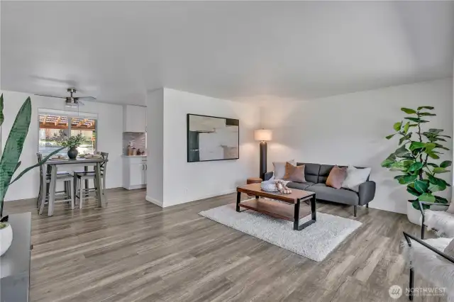 Spacious living seemlessly flows into the dining space and kitchen