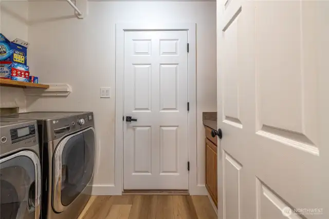 Large laundry room off of oversized 2 car garage.