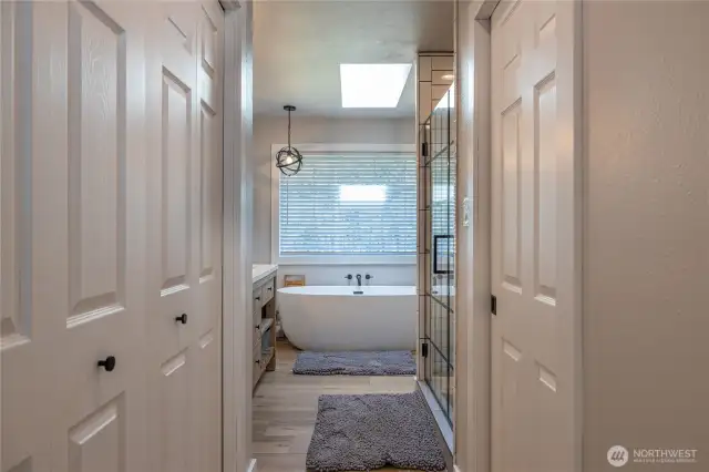 Enjoy the fully renovated primary bath with the free standing soaking tub.