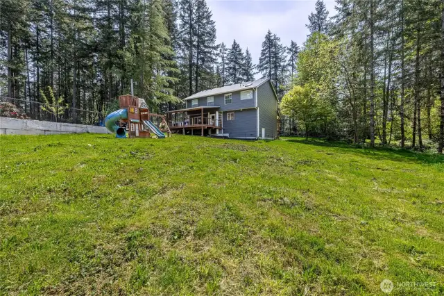 The huge backyard has plenty of room for all your games, gardening and outdoor desires.