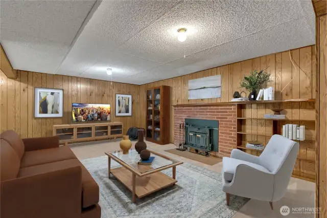 Another wood burning fireplace and large